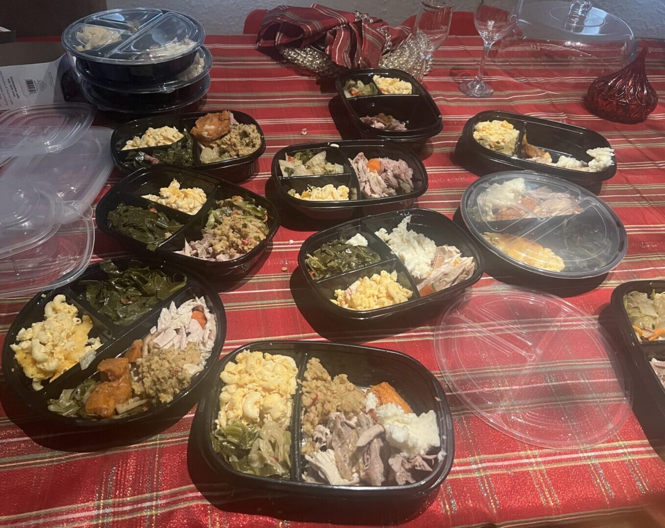 A table with many different types of food in bowls.