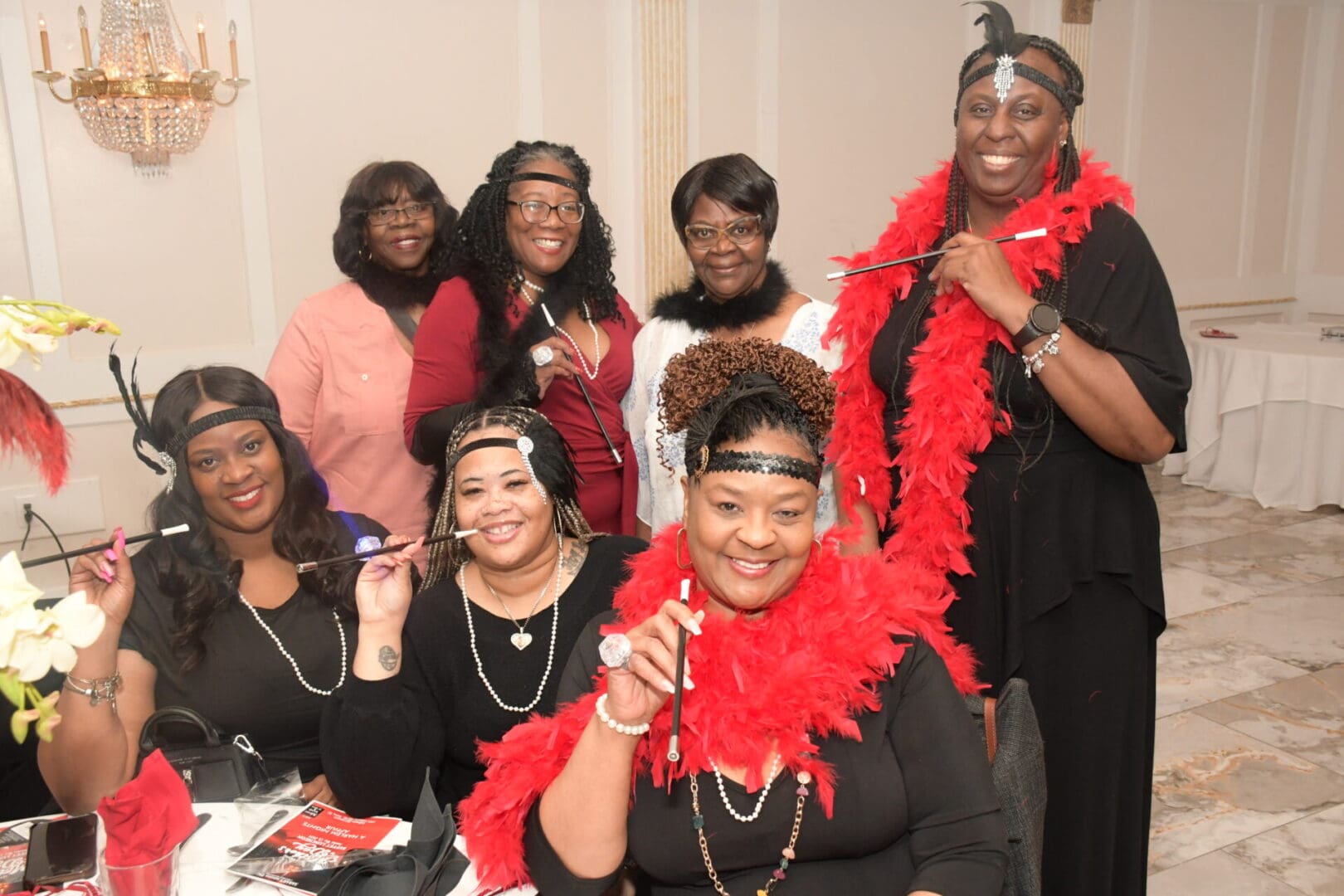 A group of women posing for the camera.