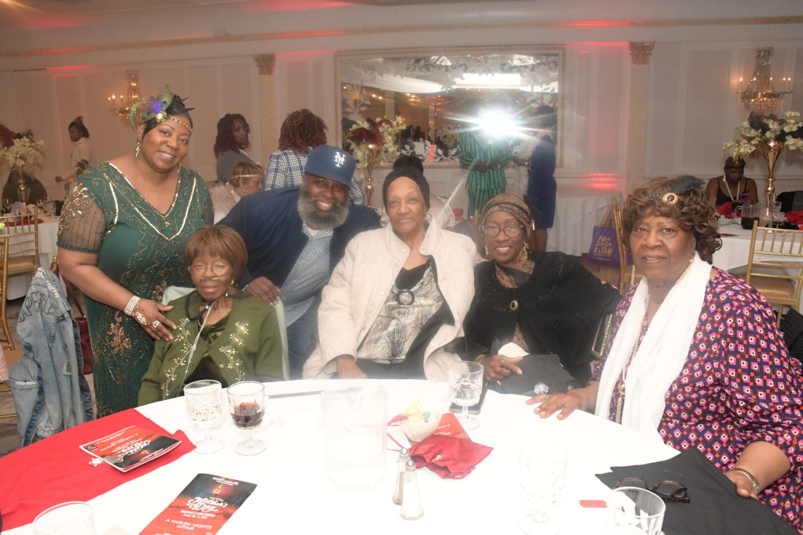 A group of people sitting at a table.