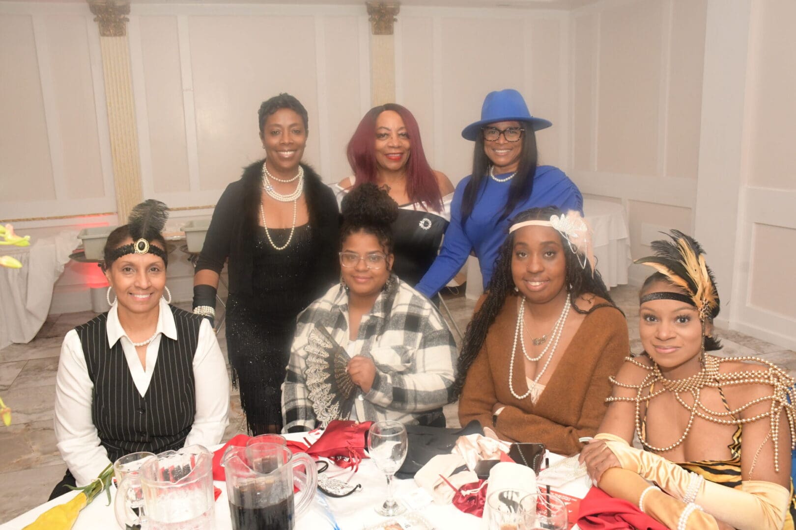 A group of women sitting at a table.