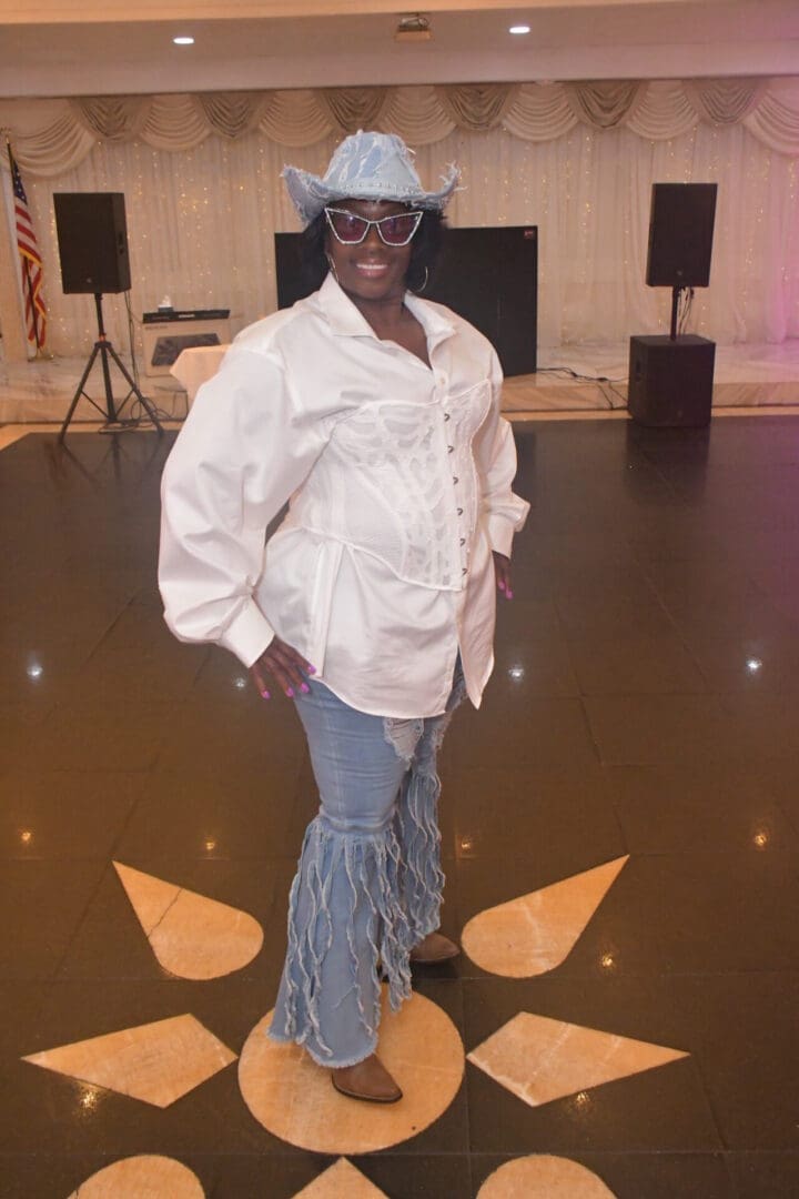 Person in unique denim and white outfit.