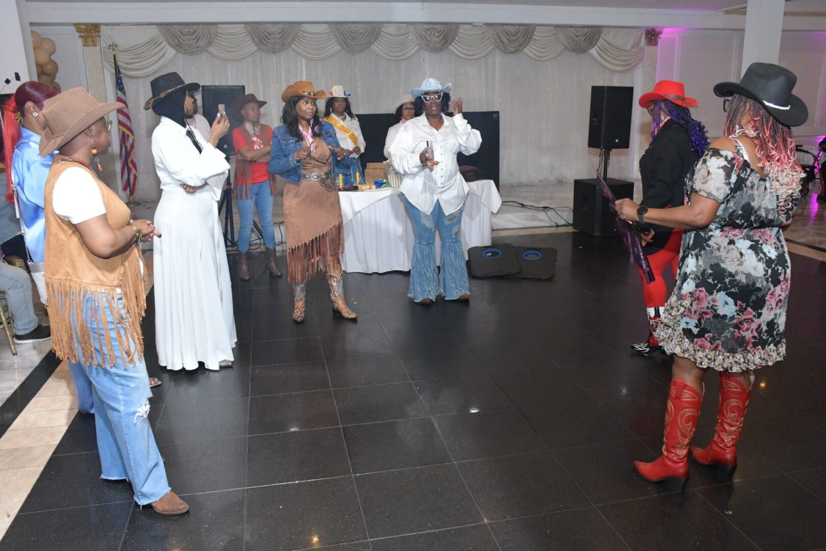 People dancing at a Western-themed party.