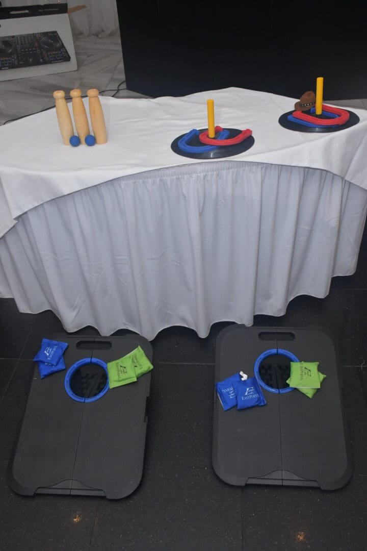 Bean bag toss game with wooden pins.