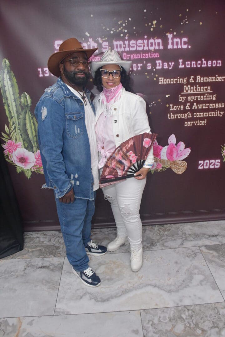 Couple posing at Mother's Day luncheon event.