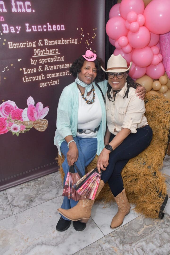 Two people posing at themed event.